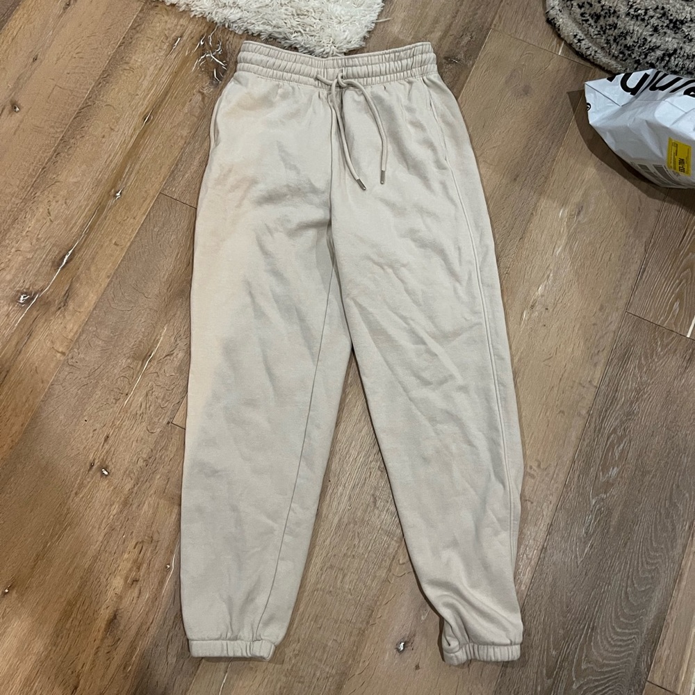 H and M tan women’s sweats size small!! Only worn once super flattering